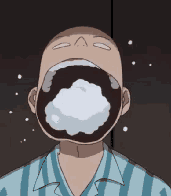 a man with his mouth open and foam coming out of his mouth .
