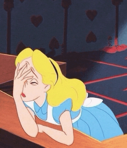 alice from alice in wonderland is laying down with her hand on her face .