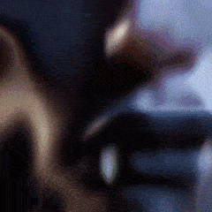 a blurry picture of a person 's face with a blurred background .