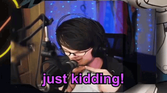 a picture of a man with headphones and the words just kidding