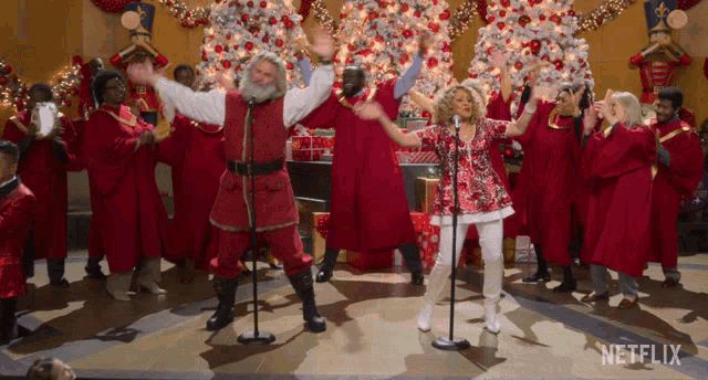 Singing Santa Claus GIF - Singing Santa Claus Kurt Russell GIFs