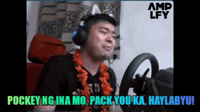 a man wearing headphones and a lei says " pokey ng ina mo "