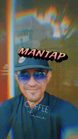 a man wearing sunglasses and a hat that says mantas