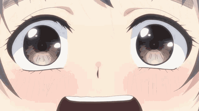 a close up of a girl 's eyes with a tear coming out of them
