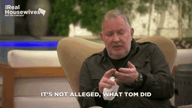 a man sitting in a chair with the words " it 's not alleged what tom did " written below him