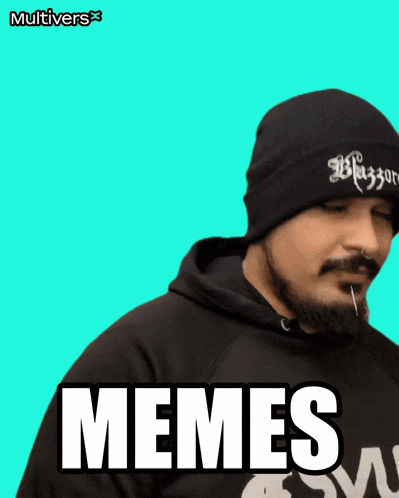 a man wearing a black beanie and a black hoodie with the word memes on the front