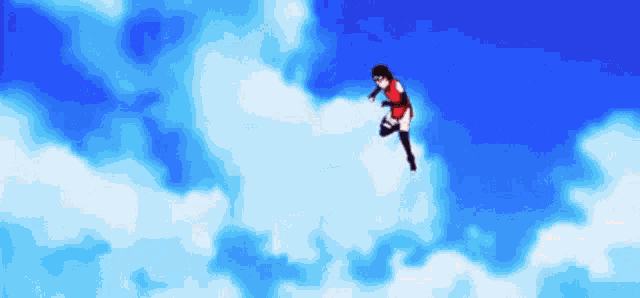 a person is flying through the air in a cloudy blue sky .