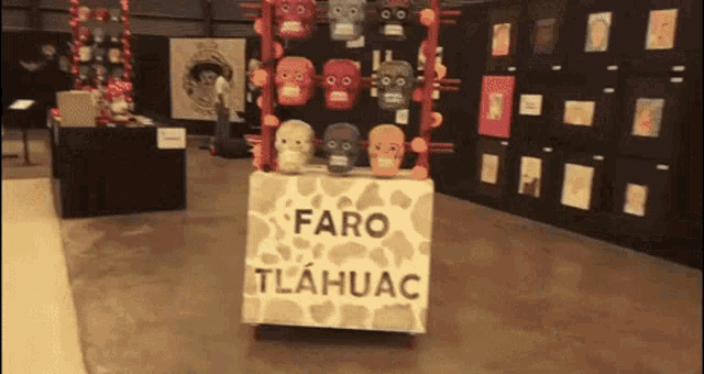 a sign that says faro tlahuac on it in a museum