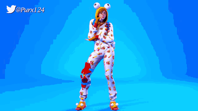 a girl in a frog costume stands on a blue background