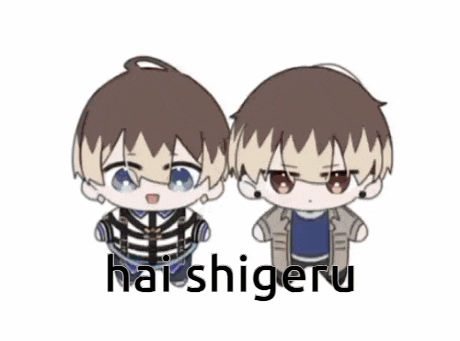 a couple of stuffed animals standing next to each other with the words hai shigeru written on the bottom