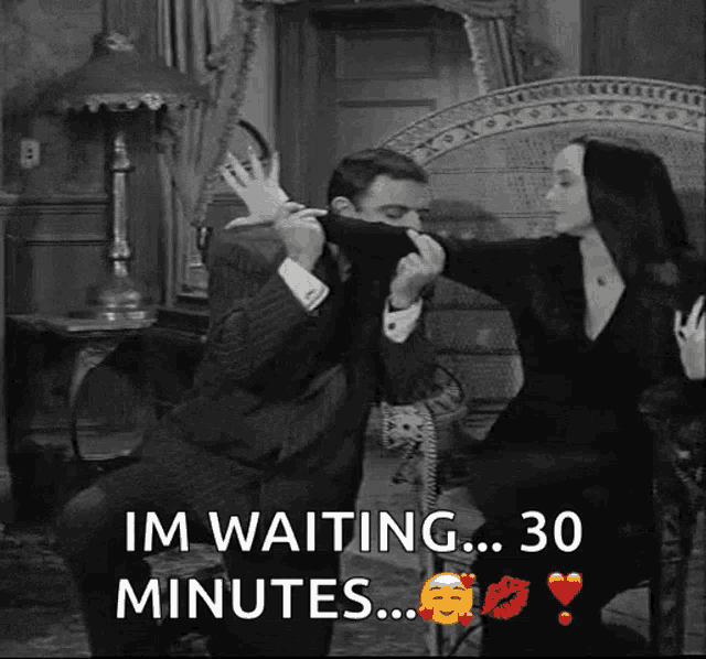 a black and white photo of a man and a woman with the words im waiting 30 minutes