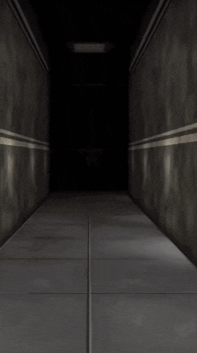 a gray tiled floor with a dark wall in the background