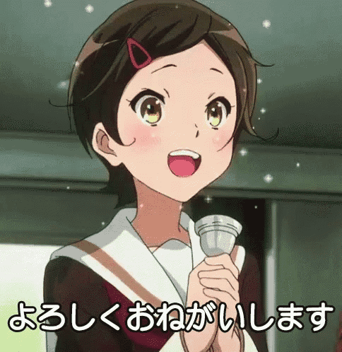 a girl in a school uniform is holding a microphone and making a face .