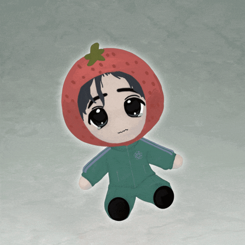 a stuffed animal with a strawberry hat on his head