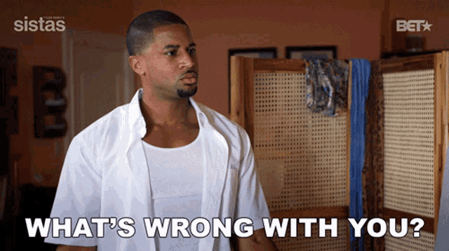 a man says what 's wrong with you in front of a screen
