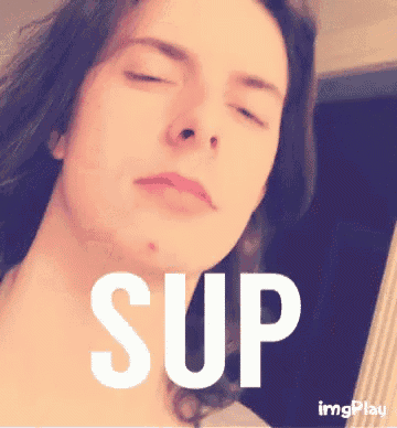 a close up of a woman 's face with the word sup written on it