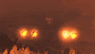 a painting of a fire with a purple glow