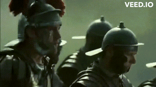 a group of roman soldiers standing next to each other with the words veed.io visible in the corner