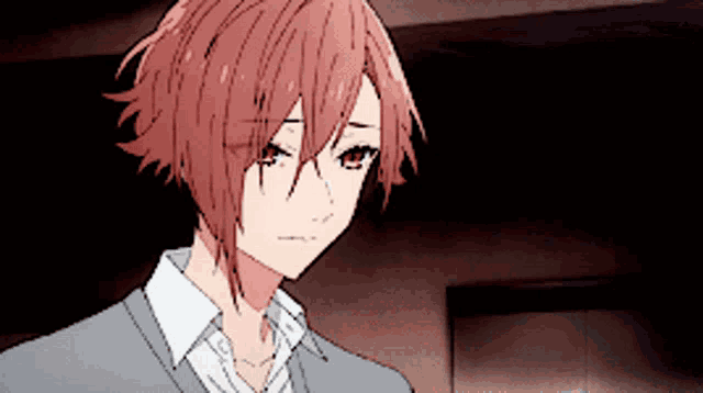 a close up of a person with red hair