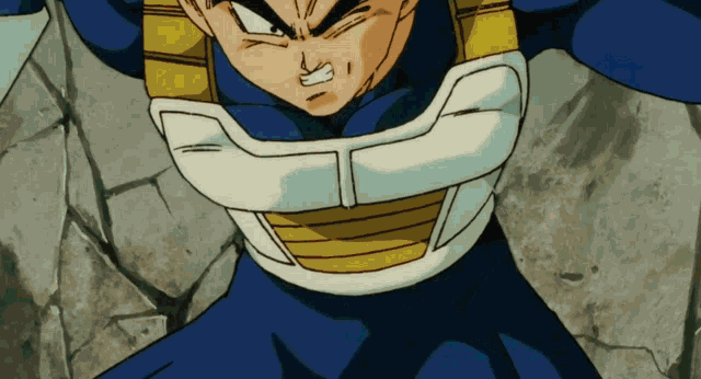 a close up of a cartoon character 's chest with a t on it