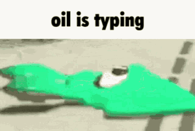 a green frog is laying on the ground with the words oil is typing written above it .