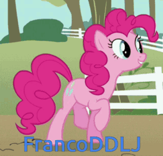pinkie pie from my little pony is standing in front of a fence