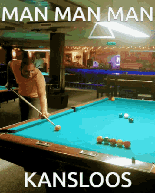 a man playing pool in a pool hall with the words man man man kansloos