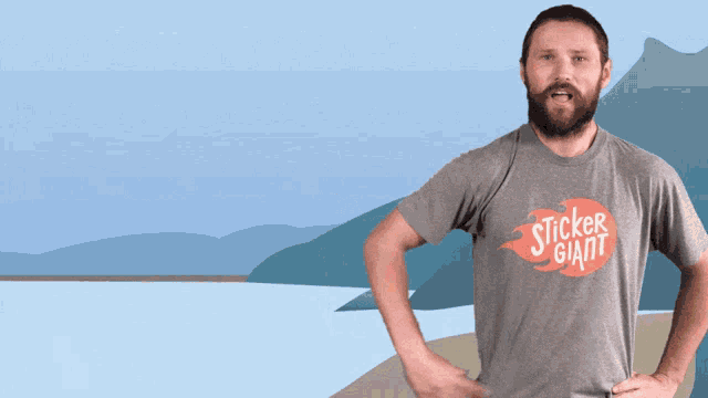 a man with a beard wearing a sticker giant t-shirt