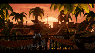 a person standing on a balcony overlooking the ocean with a sunset in the background