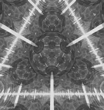 a black and white image of a kaleidoscope with a lot of lights coming out of it