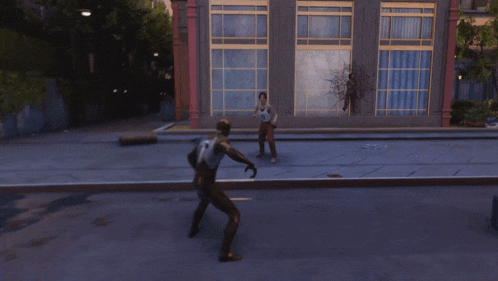 a statue of a man in a superhero costume is being attacked by another statue