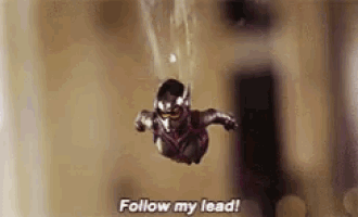 an ant man is flying through the air and saying `` follow my lead ! ''