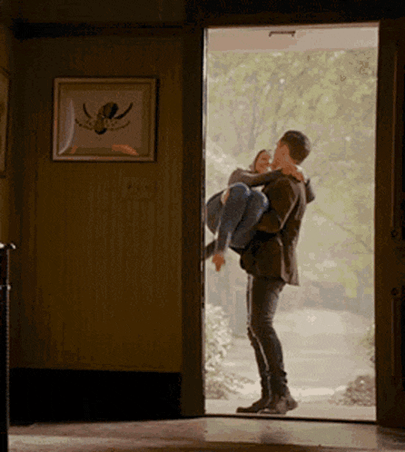 Carrying Her Over The Doorway Romantic GIF - Carrying Her Over The Doorway Romantic Enzo And Bonnie GIFs