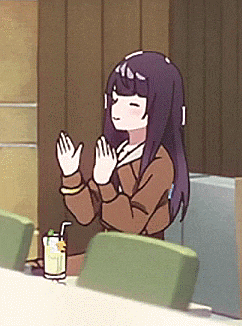 a girl with purple hair is clapping her hands