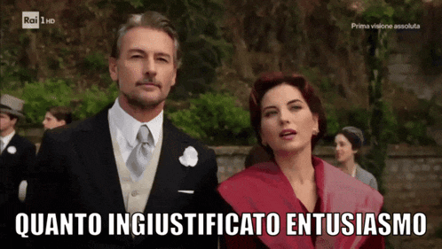 a man and a woman are standing next to each other with the caption quanto ingiustiziato entusiasmo