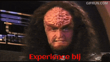a gif from gifrun.com shows a man with a beard and long hair