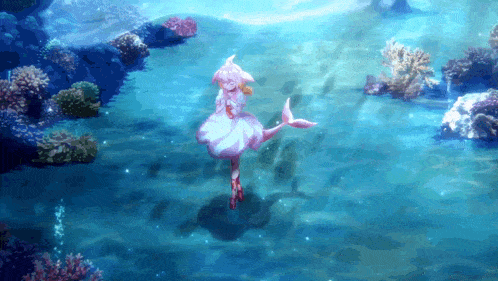 a mermaid in a white dress is in the ocean