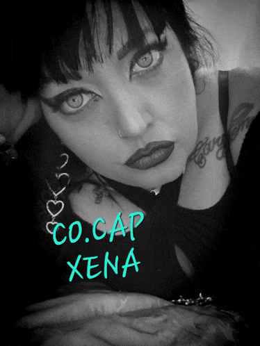 a black and white photo of a woman with the name co.cap xena