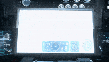 a computer monitor displays a white screen with a few icons on it including one that says focus