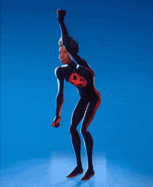 a man in a black and red superhero suit is dancing