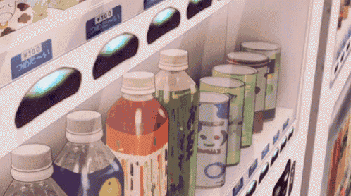 a vending machine filled with bottles and cans including one that says ice tea