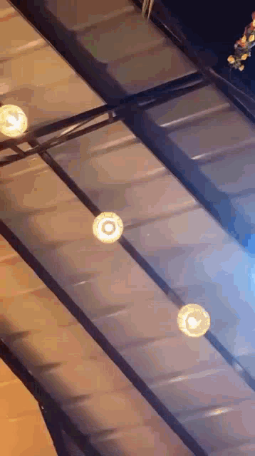 a ceiling with a lot of lights on it