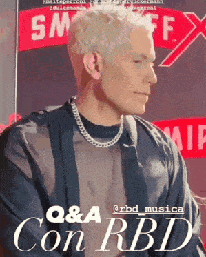 a poster of a man with the words q & a con rbd at the bottom