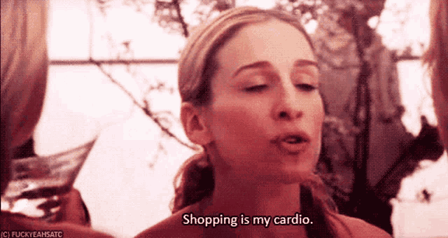 a woman says shopping is my cardio in a close up of her face
