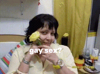 a woman is holding a flower in her mouth and the words gay sex are visible