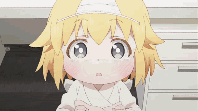 a little girl with a bandage on her head