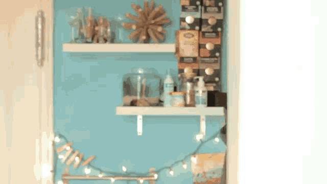 a blue wall with shelves and a sign that says " ah "
