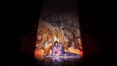 a painting of a tiger and a snake