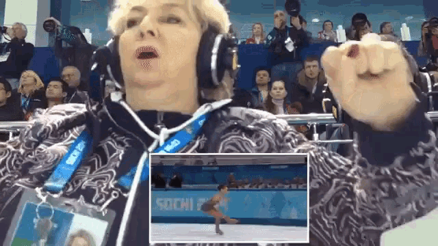 a woman wearing headphones and a sochi lanyard watches a skater