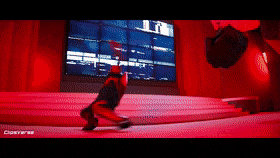 a person is doing a trick in front of a large screen that says converse on it